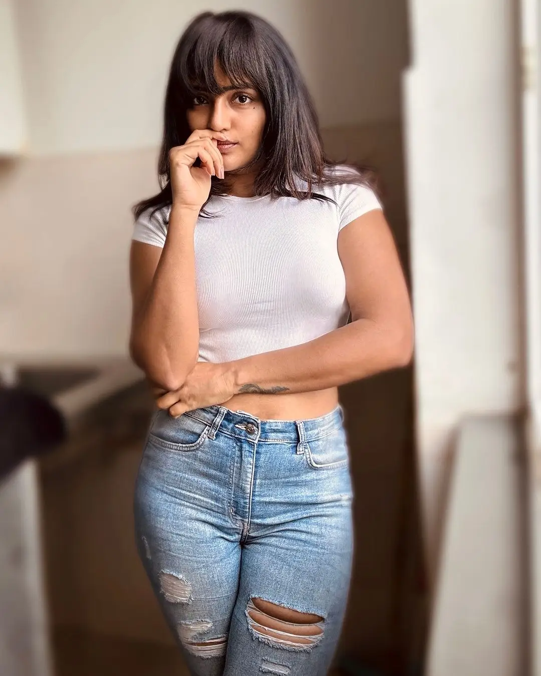 Eesha Rebba Stills in Beautiful White T Shirt Blue Jeans